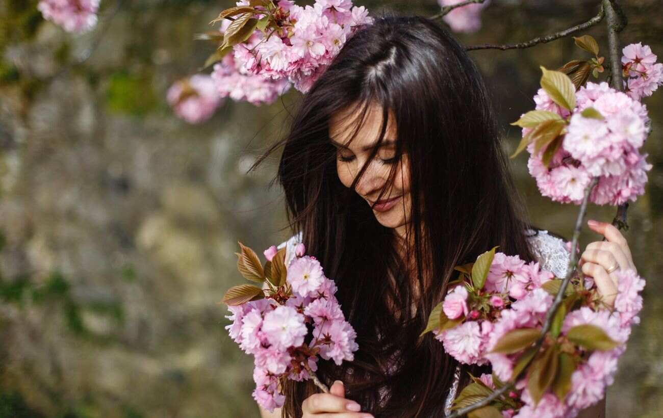 beautiful brunette woman smells